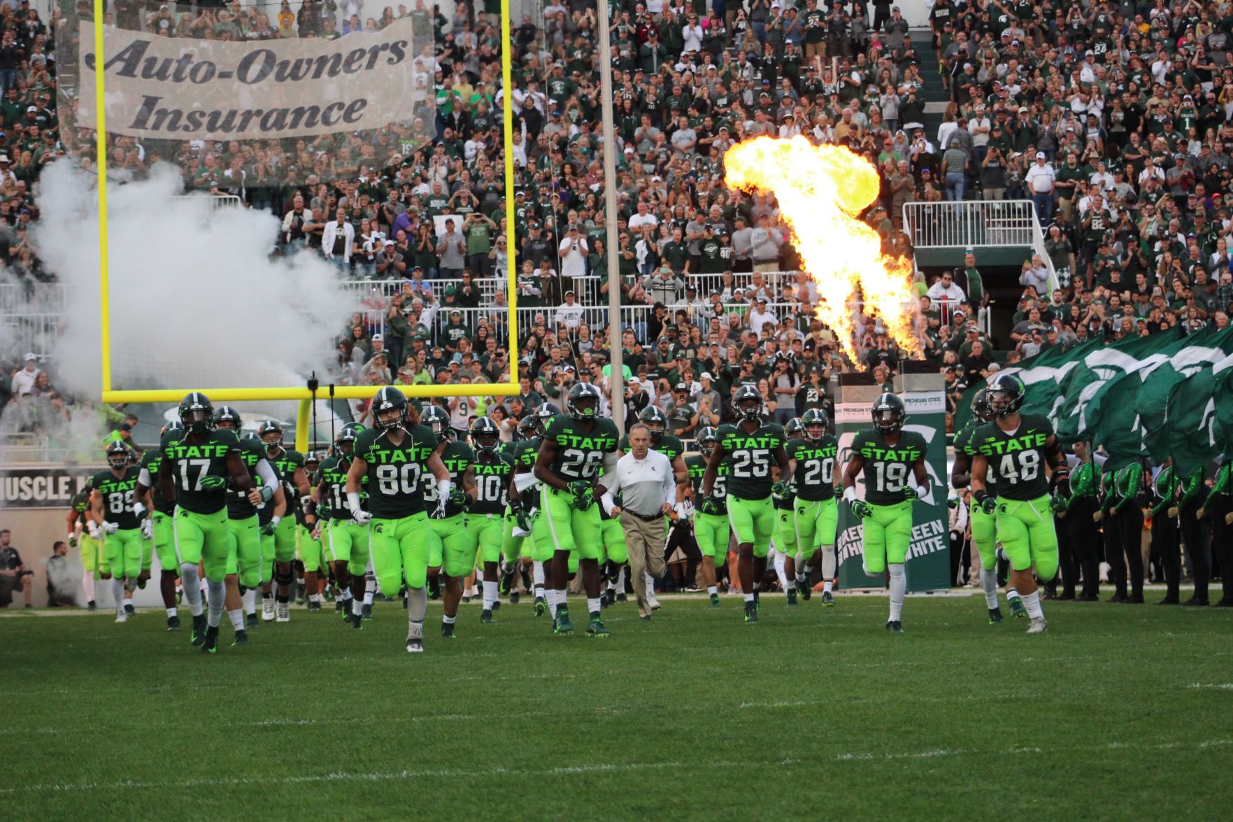 Mark Dantonio and the Spartans take the field
